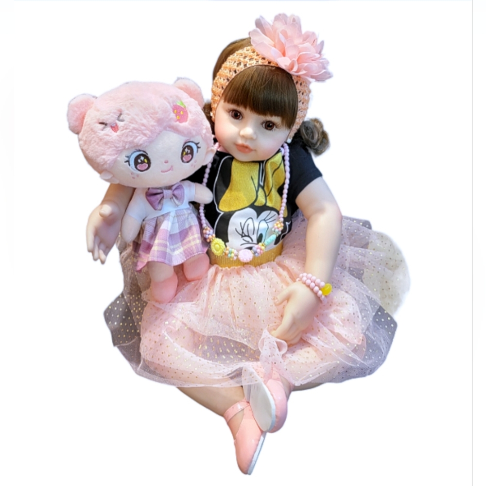 24 inch silicone vinyl Reborn doll with more than 10 accessories.